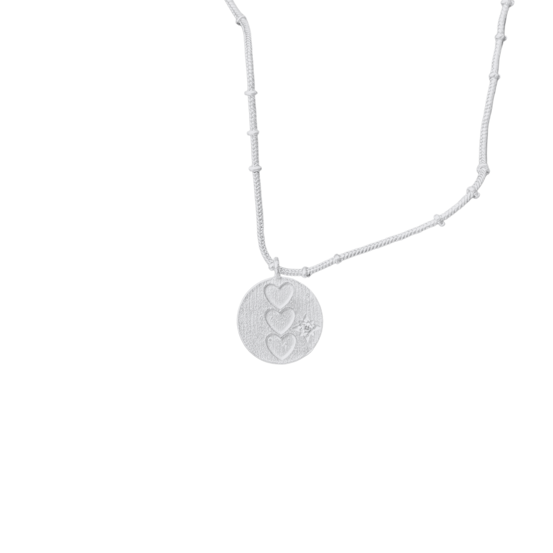 CIRCLE OF HEARTS PENDANT