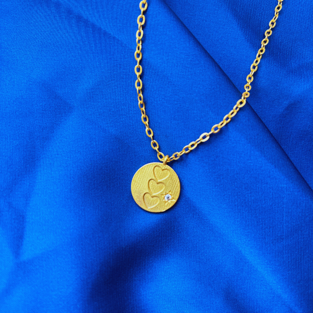 CIRCLE OF HEARTS PENDANT