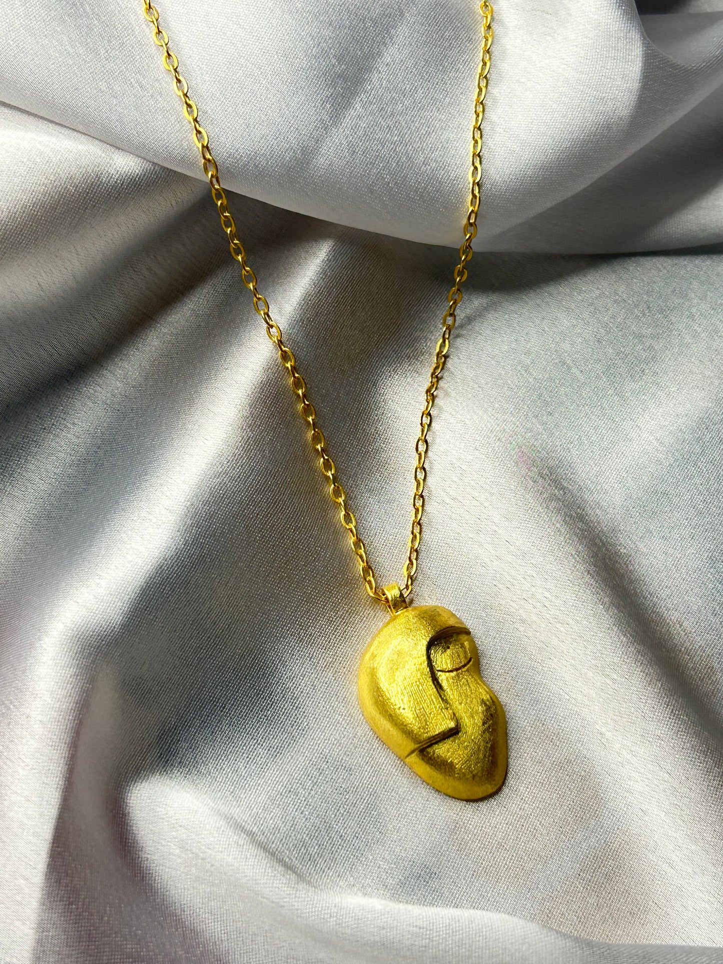 "SMIRK OFF" FACE NECKLACE