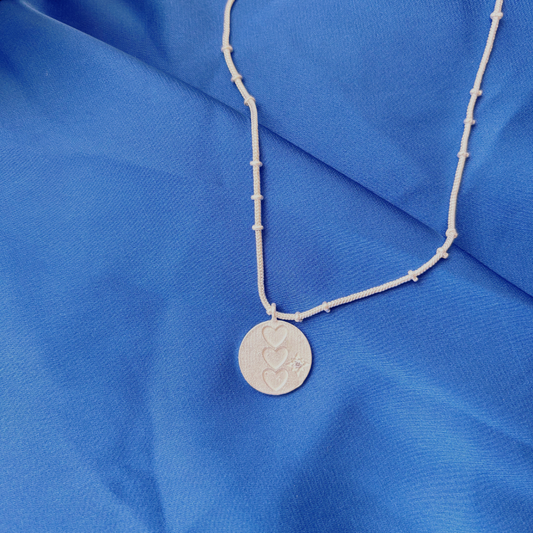 CIRCLE OF HEARTS PENDANT
